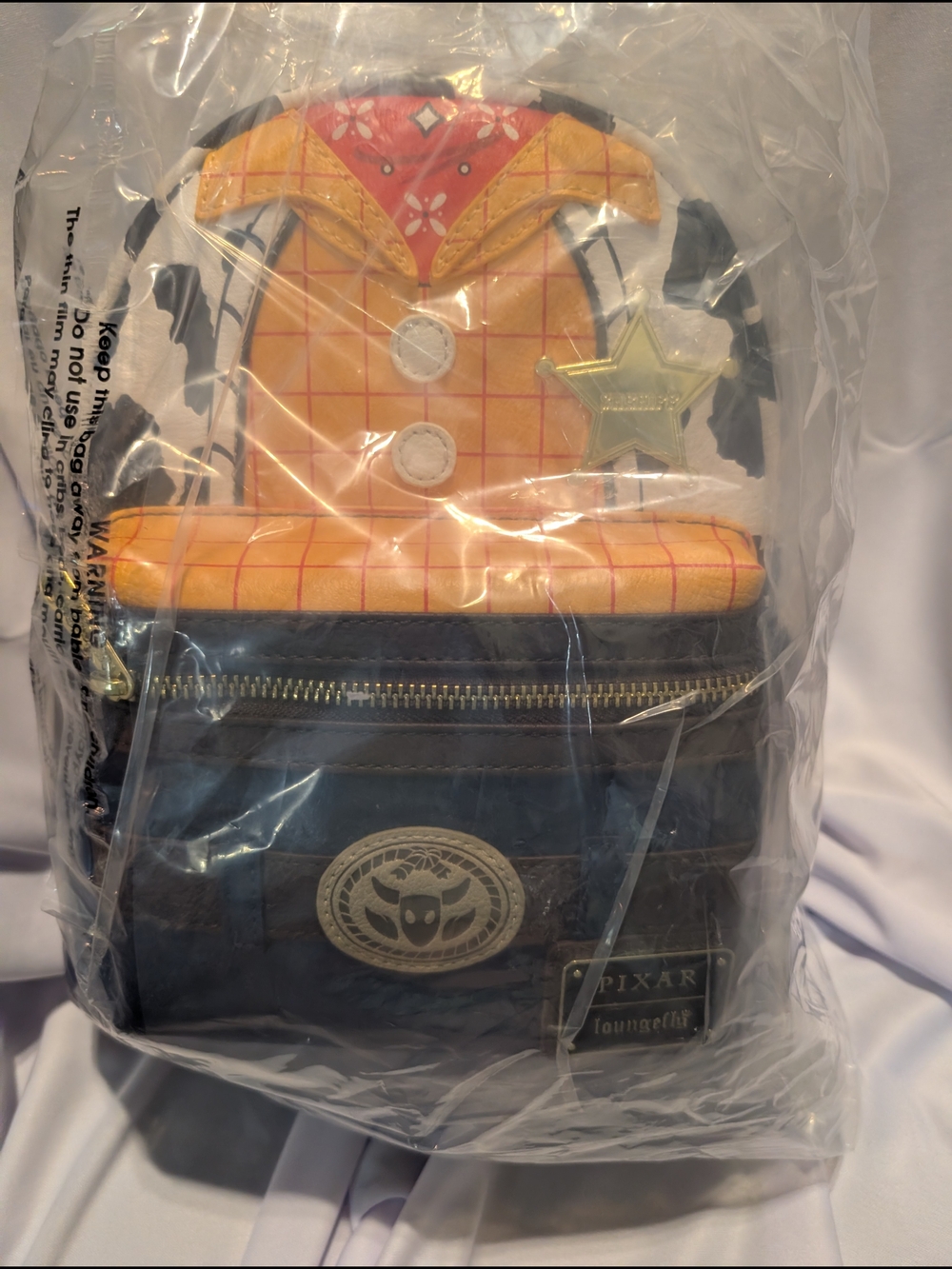 Loungefly Pixar Woody Mini Backpack in Yellow, Brown & Red Accents